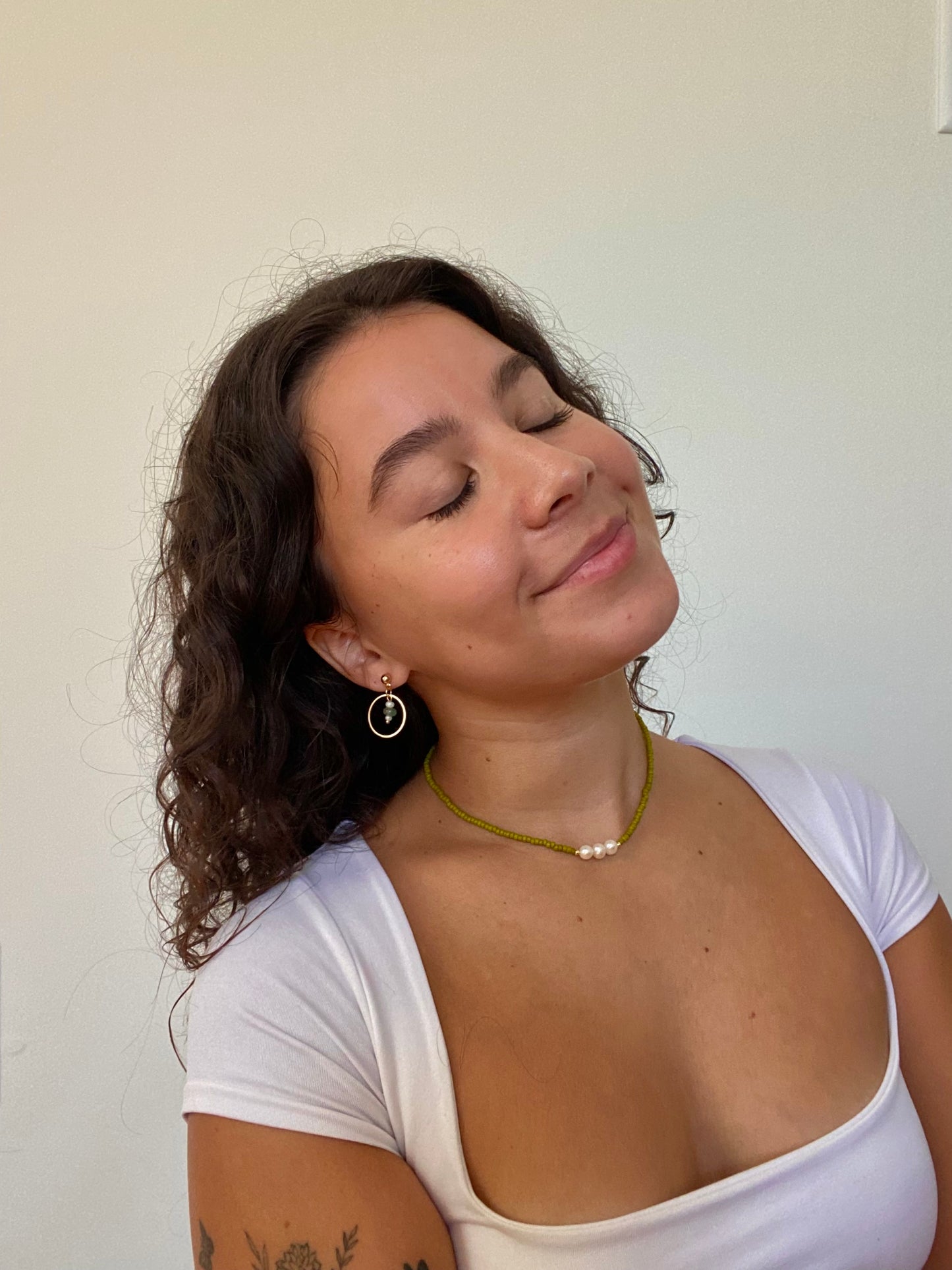 Thalía dangles