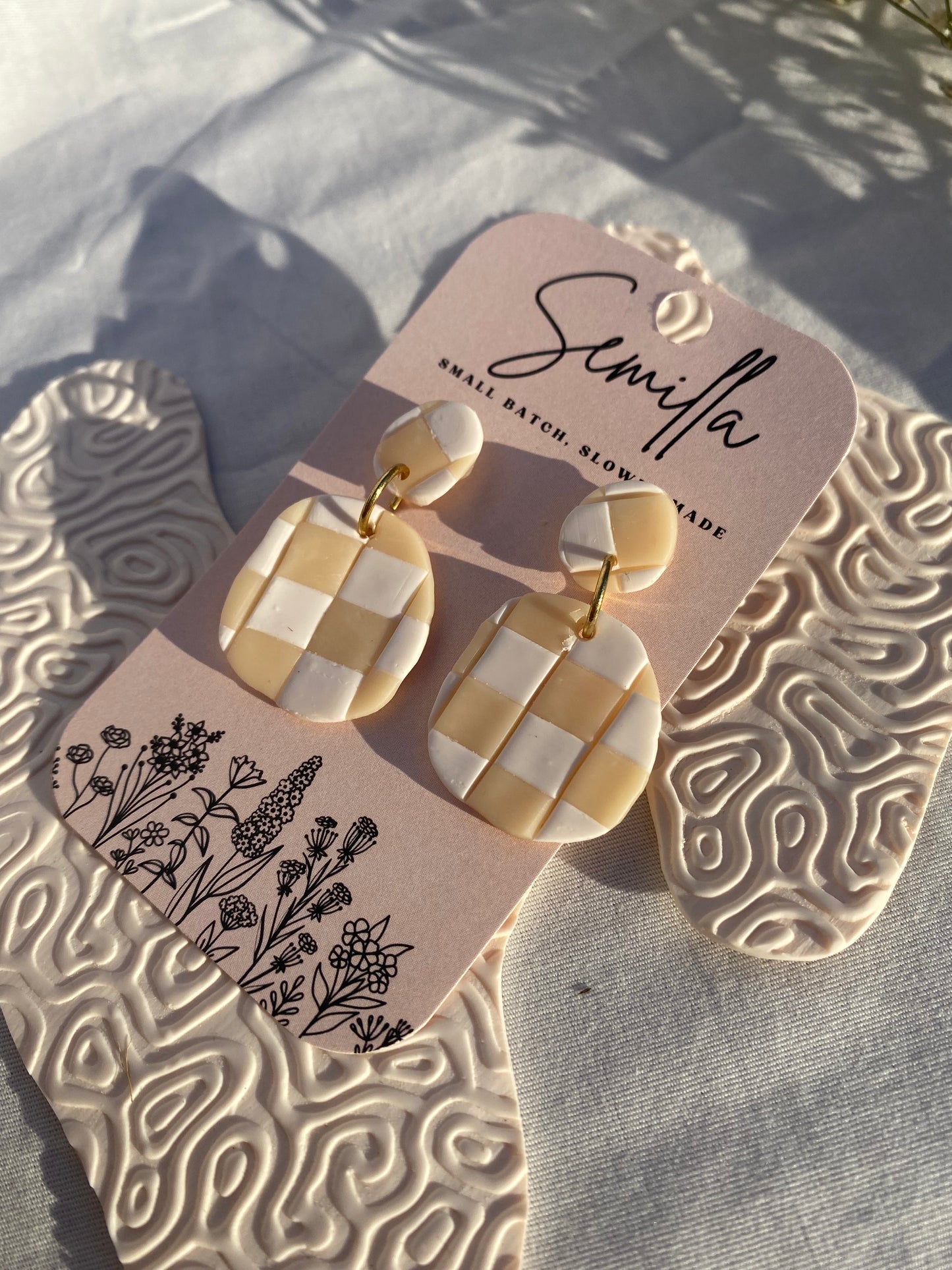 Dolores in Translucent and White Checkers