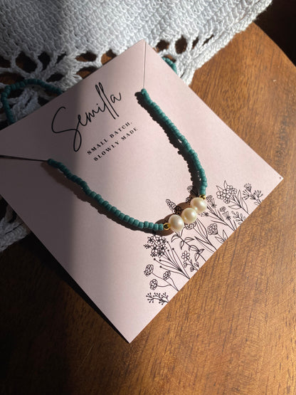 Lola in deep teal